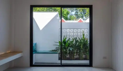 Window to the courtyard at Sarayah Phuket Villa