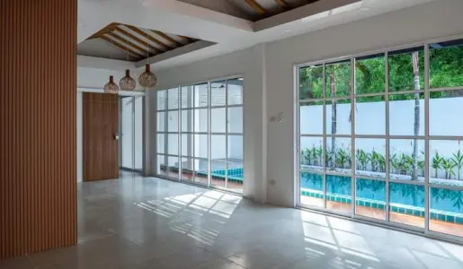 Spacious Living Room with View to Private Pool at Sarayah Phuket Villa