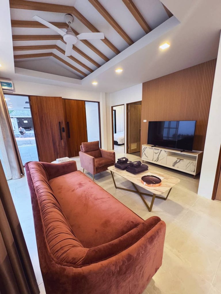 Cozy Living Room with View to Private Pool at Sarayah Phuket Villa